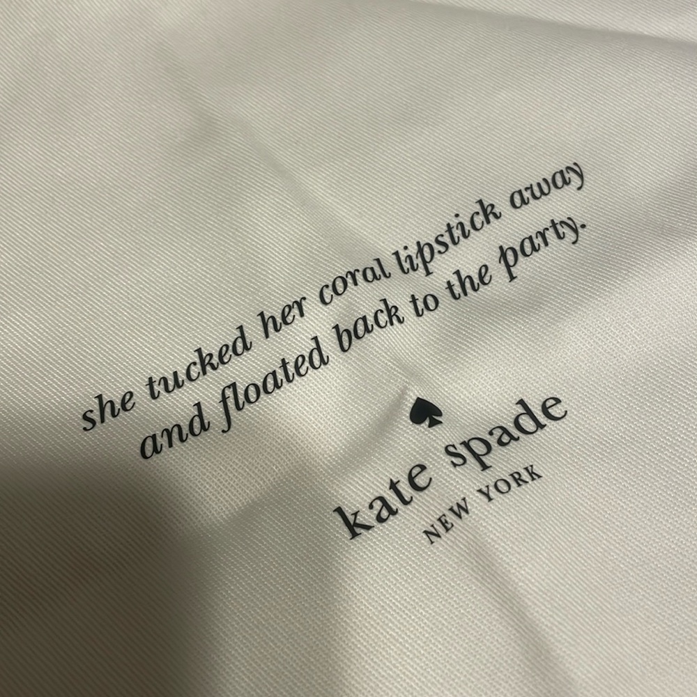 Kate Spade dust bag ♠️ She tucked her coral lipstick floated back to the party